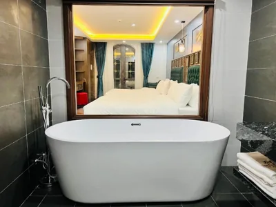 Vierbettzimmer mit Badewanne — Sapa Grand Hills Hotel Apartments